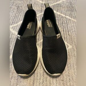 Adidas women’s slip on black and white shoes